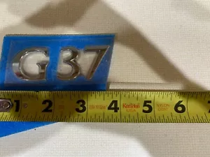 INFINITI G37 LETTERS CHROME EMBLEM OEM NEW - Bild 1 von 1