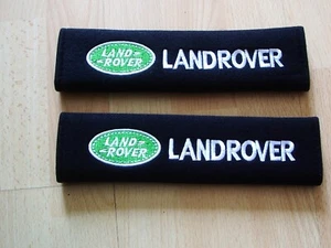 A PAIR OF NEW EMBROIDERED LAND ROVER COMPATIBLE SOFT SEAT BELT COVERS - Picture 1 of 2