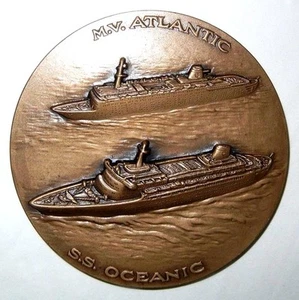 ITALIA / HOME LINES NAVE DA CROCIERA S.S. OCEANIC & M.V. MEDAGLIA ATLANTICA / BRONZO N134 - Foto 1 di 6