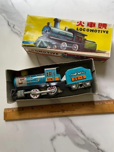 Locomotiva vintage anni 60 ST-1 giocattolo in latta treno a frizione 570 MF-712 7,5" - Foto 1 di 12