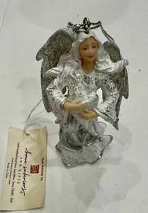 Ángel de Navidad para interiores del hogar sosteniendo un corazón nuevo adorno - Imagen 1 de 4