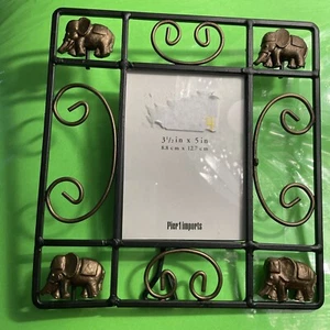 Marco de fotos Pier 1 elefantes metal negro y bronce 3 1/2” x 5” nuevo sin caja - Imagen 1 de 6