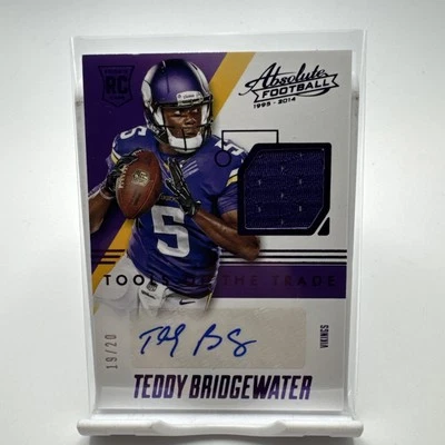 TEDDY BRIDGEWATER 2014 ABSOLUTE TOOLS OF THE TRADE ROOKIE JERSEY AUTO RC /20 RPA - Image 1 of 4