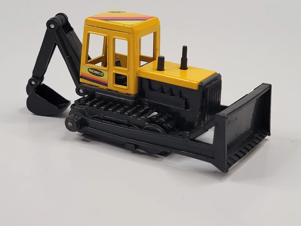 Retroexcavadora retroexcavadora Bulldozer Remco 1986 diecast vintage Foto 1 de 4