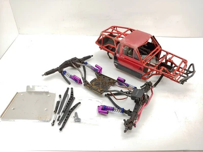 Axial Wraith ? Project - Red Cage mit Innen- & Vorder-/Hinterachsen mit Links Stoßdämpfer - Bild 1 von 4
