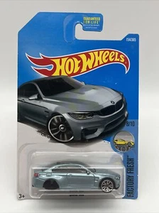 Hot Wheels FEHLER AUTO - keine Hinterräder - 2016 BMW M4 blau werkseitig frisch 1/64 - Bild 1 von 5