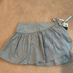 Neu mit Etikett Ralph Lauren BLAUER BAUMWOLLCORDROCK, MÄDCHEN 12, GERAFFT, SEITLICHE SCHLEIFE, KNOPF - Bild 1 von 3