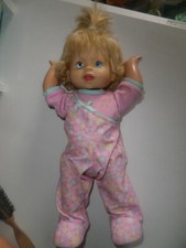 Fisher Price battery operated walk & giggle doll with blonde hair, blue eyes.