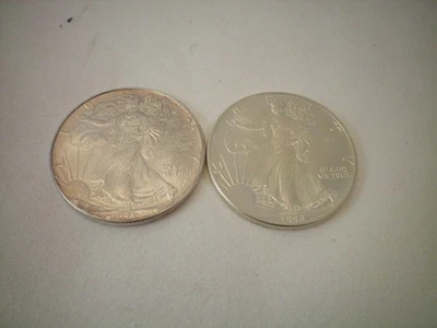 2014 Silver Eagle 1 oz .999 fine silver Lot of 2 Toning 1992, 1993 - Image 1 of 4