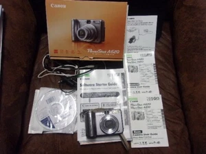 CANON POWER SHOT A620~7.1MP DIGITAL CAMERA~SILVER~G/C COMPLETE W/CORDS/BOOKS/CD - Picture 1 of 5