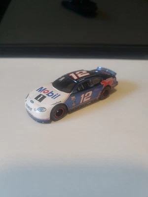 Jeremy Mayfield #12 Mobil 1 Taurus, 1999 RC bajo las luces 1:64, suelto Foto 1 de 4