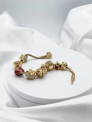 Brazalete de cadena de serpiente de oro amarillo Linx con cierre personalizado con dijes de oro Foto 1 de 4