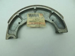 2X4-25330-00 NOS Yamaha Brake Shoe IT250 IT400 IT450 YZ250 YZ400 YZ465 W10024 - Picture 1 of 2