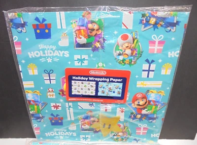 Hoja de papel de envolver Navidad Nintendo Mario 24" x 24" con etiqueta de regalo estrella extra Foto 1 de 3
