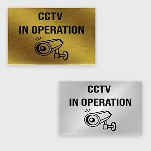 Letrero de CCTV en acción - 10 x 6,5 pulgadas, laminado de plástico plateado y dorado - Imagen 1 de 6