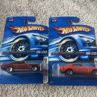 2005 Hot Wheels '69 Pontiac GTO 18/20 Dicast Car Maroon  Orange - Image 1 of 4