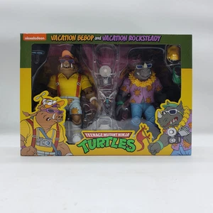 NECA Teenage Mutant Ninja Turtles Vacation Bebop and Vacation Rocksteady Action - Bild 1 von 17