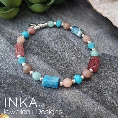 Brazalete grueso de plata de ley 925 mezclado con cuentas de piedras preciosas rosas y azules de INKA Foto 1 de 4