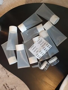 10 Clear Plastic Travel Bottles. 1 Funnel. 2 Small Cream Pots & 1 Sticker - Picture 1 of 1