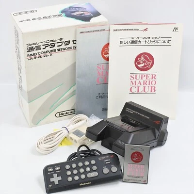 Nintendo Super Mario Club FCN000-09 + Famicom Family Computer Network System 488 - Image 1 of 4