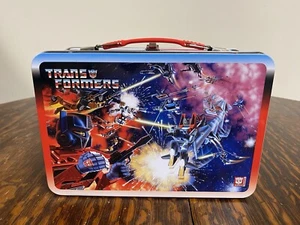 TRANSFORMERS / GI JOE CLASSIC STYLE TIN LUNCH BOX! GAMESTOP EXCLUSIVE - Picture 1 of 7