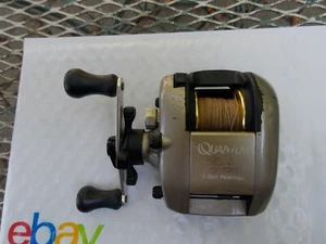 Quantum EX 500 High Speed Baitcastrolle mit Flipn Switch SAUBER 9/25 - Bild 1 von 5