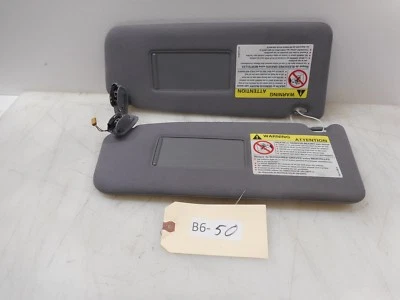 AUDI A6 QUATTRO 2001 AWD parasoles derecho e izquierdo; falta una cubierta de tornillo de montaje Foto 1 de 3