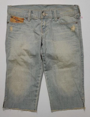 Pantalones de mezclilla recortados Abercrombie para niña azul con tinte naranja dobladillo crudo talla 14 Foto 1 de 4