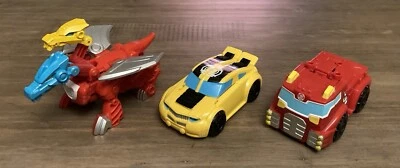 Transformers Rescue Bots Bundle- Heatwave, Dino Bots Heatwave & Bumblebee Car - Image 1 of 4