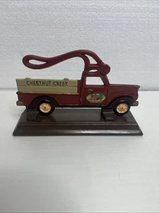 Vintage Cast Iron Chestnut Creek Country Red Farm Truck Nut Cracker Wooden Stand - Picture 1 of 3