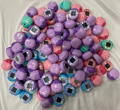 Lot of 106 Tamagotchi Handheld Devices Pink Purple Blue Green Defective *READ* - Image 1 of 4