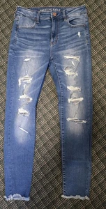 Pantalones de mezclilla desgastados American Eagle Hi Rise Jegging 8 (se adapta a 30 W 28,5 L) - Imagen 1 de 6