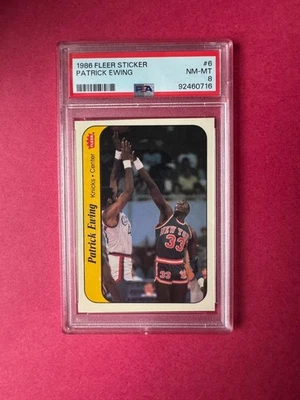 1986 Fleer Patrick Ewing sticker #6 HOF PSA 8 - Image 1 of 2