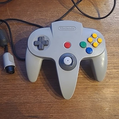 CONTROLLER JOYSTICK ORIGINALE NINTENDO 64 TESTATO - Immagine 1 di 2
