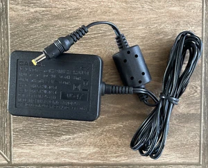 CASIO AC Adapter  AD-C52J Output 100-240V~50/60Hz 83mA————3 - Picture 1 of 2