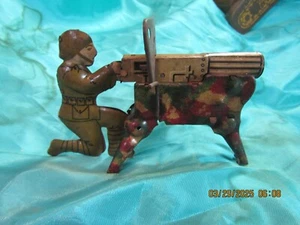 WWII CHILD'S TOY camo machine gunner!! has crank handle!! still works!! - Picture 1 of 5