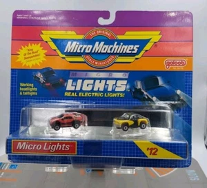 Micro Machines Micro Lights Collection #12 Tucker und Ford Sierra - Bild 1 von 9