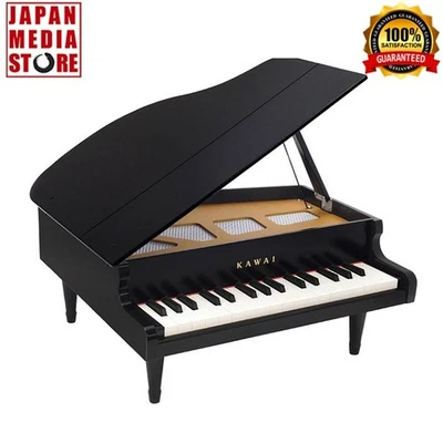 Kawai Mini Pianoforte a coda giocattolo per bambini nero 32 tasti F5-C8 modello 1141 NUOVO - Immagine 1 di 4