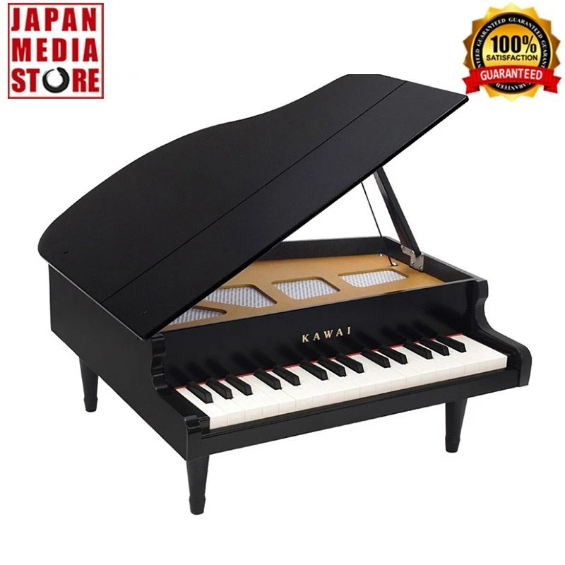 Kawai Mini Pianoforte a coda giocattolo per bambini nero 32 tasti F5-C8 modello 1141 NUOVO - Immagine 1 di 4