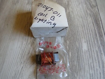 Bobina de iluminación Kawasaki NOS 21047-011 B G3 G4 G5 MC1 KV G3SS G3TR G4TR KV100 OM19 Foto 1 de 4