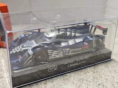 Coche de Fórmula 1 Slot.it Lola B12/87 escala 1:32 Slot Car Foto 1 de 4