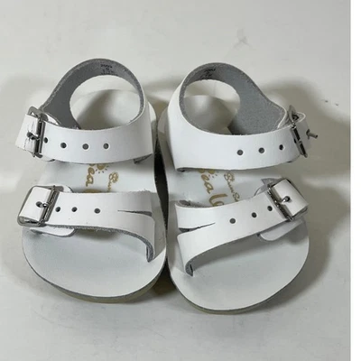 NUEVO SIN ETIQUETAS Sandalias de Cuero de Mar Blanco Ajustable Hebilla Correas Zapatos de Bebé - Talla 0 Foto 1 de 3