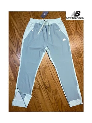 PANTALONES NEW BALANCE All Motion elásticos en 4 vías verde azulado talla S nuevos con logotipo blanco Foto 1 de 4