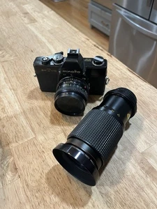 Minolta SRT MC fotocamera reflex pellicola 35 mm nera con obiettivo 55 mm e 200 mm - Foto 1 di 12