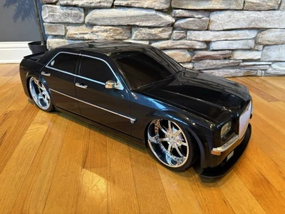 Large scale Tyco Dropstars Remote Control Car Chrysler 300 Lights And Sounds 1/6 - Image 1 of 4