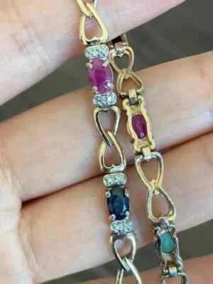 Brazalete Tenis Estilo Infinito Rubí Simulado Ovalado 7 Ct Chapado en Oro Amarillo 14K Foto 1 de 4