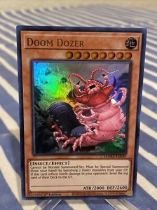 Yugioh Mama-EN049 Doom Dozer Ultra Raro 1ª Edición Tarjeta Holo Konami Juego de Cartas Coleccionables - Imagen 1 de 3