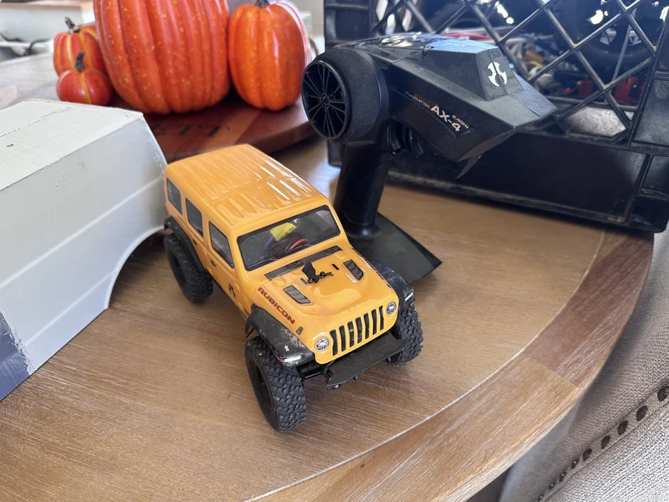 Axial SCX24 2019 Jeep Wrangler JLU CRC 1/24 4WD-RTR - Yellow  - Image 1 of 1
