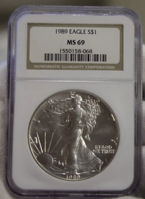 1989 US Silver Eagle $1 NGC MS69 - Image 1 of 2