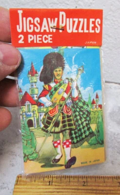 vintage 1960 dime store toy Jigsaw puzzle set of 2, Bagpipe player, Bullfight - Image 1 of 2